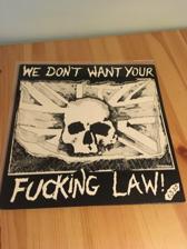 Tumnagel för auktion "We Don't Want Your Fucking Law! V/A The Partisans mfl. "