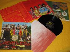 Tumnagel för auktion "THE BEATLES, Sgt Pepper’s lonely hearts… komplett, rem, gatefold, helt ny! Italy"