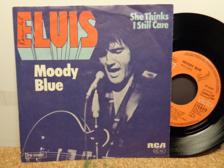 Tumnagel för auktion "ELVIS-SINGLAR: MOODY BLUE + THE WONDER OF YOU. TYSKA PRESS"