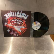 Tumnagel för auktion "Triumph - Rock n roll machine - LP - 1978"