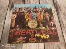 Tumnagel för auktion "The Beatles - Sgt. Peppers lonely hearts club band   LP!"