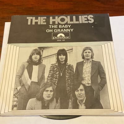 Tumnagel för auktion "The Hollies"