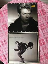 Tumnagel för auktion "Bryan Adams: 2 st lp: Reckless och Cuts like a knife, summer of -69, Run to you"