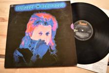 Tumnagel för auktion "Aldo Nova Subject LP hårdrock rock"