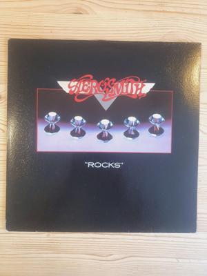 Tumnagel för auktion "Aerosmith – Rocks"