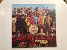 Tumnagel för auktion "THE BEATLES - sgt pepper's lonely hearts club band - Fint EX!"