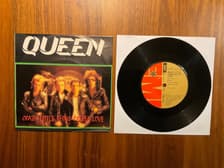 Tumnagel för auktion "Queen - Crazy Little Thing Called Love / We Will Rock (7" Single) South Aftica"