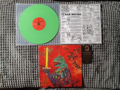 Tumnagel för auktion "King Gizzard And The Lizard Wizard - 12 Bar Bruise LP Ljusgrön/green vinyl, RARE"