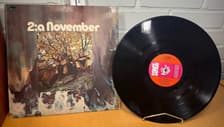 Tumnagel för auktion "November ”2:a November”, progg rock - SLP-2520"