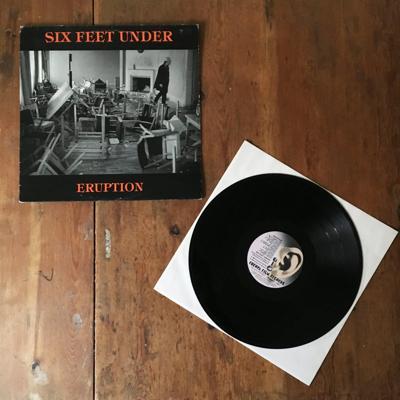 Tumnagel för auktion "Six Feet Under - Eruption LP | Hårdrock Heavy Metal"