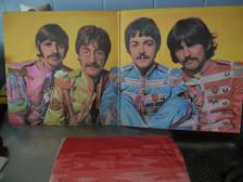 Tumnagel för auktion "LP SERGEANT PEPPER`S LONELY HEARTS CLUB BAND + SINGEL THE BEATLES."