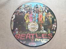 Tumnagel för auktion "Beatles, The - Pic-LP - Sgt. Peppers Lonely Hearts Club Band"