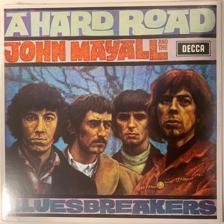 Tumnagel för auktion "JOHN MAYALL - A HARD ROAD. VINYL LP ITALY RE -21 (-67) BLUES-ROCK. INPLASTAD"