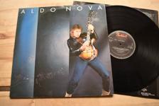 Tumnagel för auktion "Aldo Nova same LP hårdrock rock"