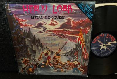 Tumnagel för auktion "HEAVY LOAD Metal Conquest SIGNERAD AV HELA BANDET Signed Autograf Manowar Anvil "