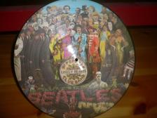 Tumnagel för auktion "LP  Picture disc Beatles -  Sgt Peppers Lonely Hearts Club Band"