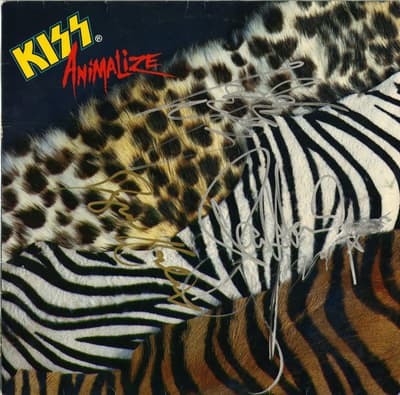 Tumnagel för auktion "KISS ANIMALIZE SIGNED BY ERIC CARR BRUCE KULICK PAUL STANLEY LP"