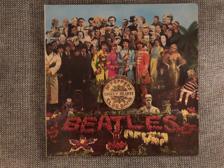 Tumnagel för auktion "The Beatles - Sgt. Peppers Lonely Hearts Club Band LP"