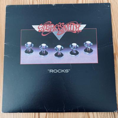 Tumnagel för auktion "Aerosmith – "Rocks""