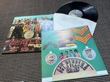 Tumnagel för auktion "LP BEATLES SGT PEPPER'S LONELY HEARTS CLUB BAND STEREO UK INSERT PCS 7027"