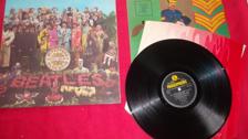 Tumnagel för auktion "The Beatles "ST Peppers lonely hearts club band" LP"