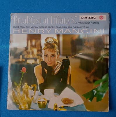 Tumnagel för auktion "Breakfast at Tiffany's * Audrey Hepburn * Mancini * LP"