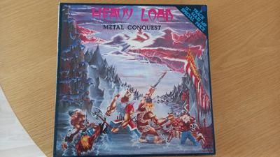 Tumnagel för auktion "Heavy Load - Metal Conquest"