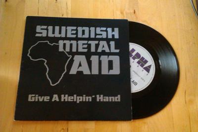 Tumnagel för auktion "SWEDISH METAL AID - Givin A Helpin´ Hand Europe, 220 Volt, Heavy Load, Aphrodite"