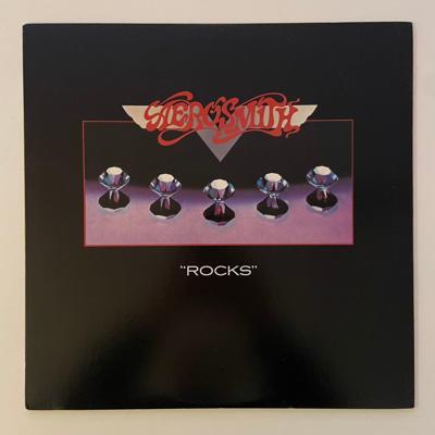 Tumnagel för auktion "Aerosmith - Rocks LP"