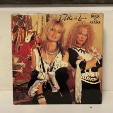 Tumnagel för auktion "Dollie De Luxe - Rock vs. Opera LP 1985"