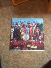 Tumnagel för auktion "The Beatles - Sgt. Peppers lonely hearts club band Englad press."