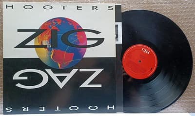 Tumnagel för auktion "Hooters – Zig Zag"