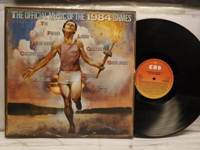 Tumnagel för auktion "OFFICIAL MUSIC OF THE 1984 FAMES - V/A - PROMO"