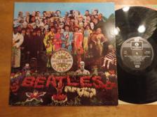 Tumnagel för auktion "The Beatles "Sgt. Peppers Lonely Hearts Club Band""