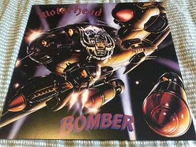 Tumnagel för auktion "Motörhead - Bombet, Vinyl Lp"