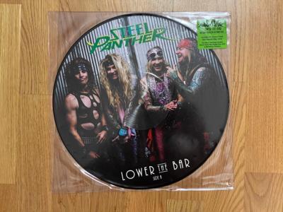 Tumnagel för auktion "Steel Panther - Lower The Bar (Picture Vinyl) SEALED"