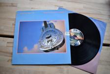 Tumnagel för auktion "Dire Straits Brothers in Arms LP pop rock mark knopfler"