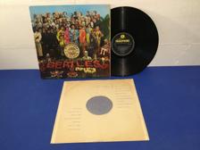 Tumnagel för auktion "The Beatles - Sgt Pepper?s Lonely Hearts Club Band UK Orig-67 MONO !!!!!"