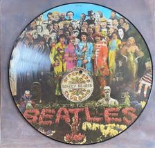 Tumnagel för auktion "The Beatles - Sgt. Pepper's Lonely Hearts Club Band - Picture disc LP"