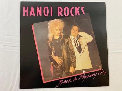 Tumnagel för auktion "HANOI ROCKS Back To Mystery City LP -83 UK lick LICLP1"