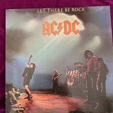 Tumnagel för auktion "AC DC "Let there be rock”(Ac dc,bon scott,Angus Young)"