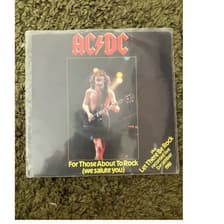 Tumnagel för auktion "AC/DC - For Those About To Rock (We Salute You) 7" Vinyl"