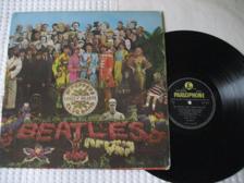 Tumnagel för auktion "The Beatles Sgt. Peppers Lonely Hearts Club Band LP"