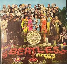 Tumnagel för auktion "Beatles ?– Sgt. Pepper's Lonely Hearts Club Band, vinyl LP skiva"