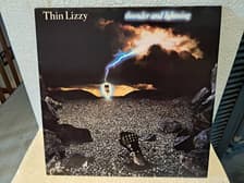 Tumnagel för auktion "Thin Lizzy - Thunder and lightning (I toppskick!)"