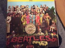 Tumnagel för auktion "THE BEATLES LP sgt pepper's lonely hearts club band re canada 1978 grårosa vinyl"