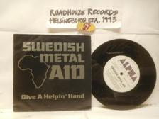 Tumnagel för auktion "SWEDISH METAL AID - V/A - ETCHED/SIGNERAD"