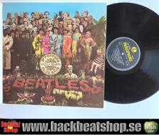 Tumnagel för auktion "THE BEATLES - SGT. PEPPER'S LONELY HEARTS CLUB BAND"