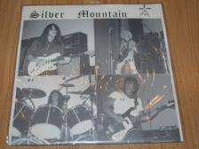 Tumnagel för auktion "Silver Mountain Singel Man Of No Present Existence unik signerad nyskick 1979"