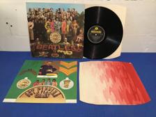 Tumnagel för auktion "The Beatles - Sgt Pepper?s Lonely Hearts Club Band UK Orig-67 STEREO KOMPLETT!!!"